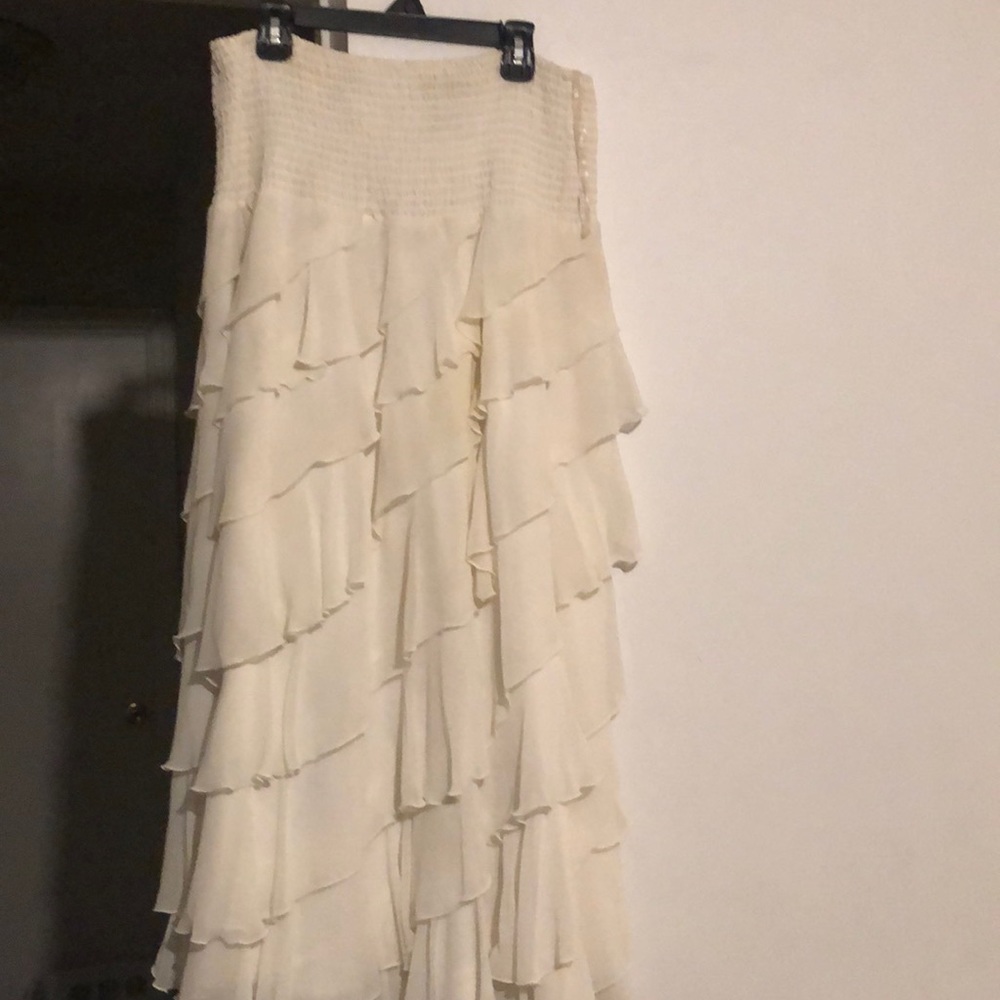 Large, 100% polyester eggshell pleated layered skirt